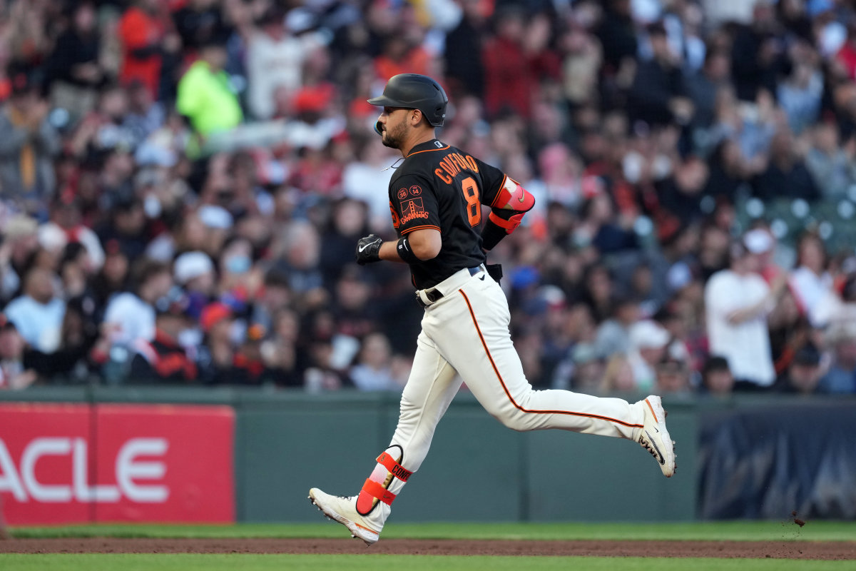 SF Giants designated hitter Michael Conforto rounds the bases after hitting a home run against the Texas Rangers during the fourth inning at Oracle Park on August 12, 2023.